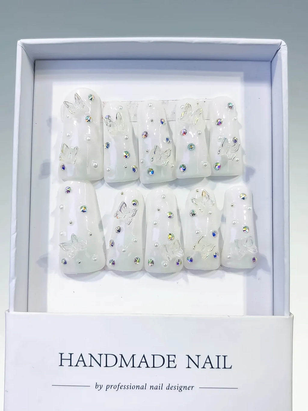 White Silver Multicolor Solid color Butterfly Pearl Rhinestone 3D press on nails full set view
