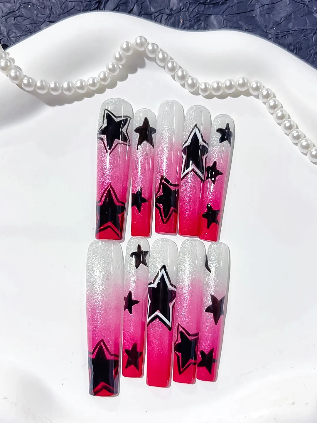 White Pink Black Ombre Star 3D press on nails close up