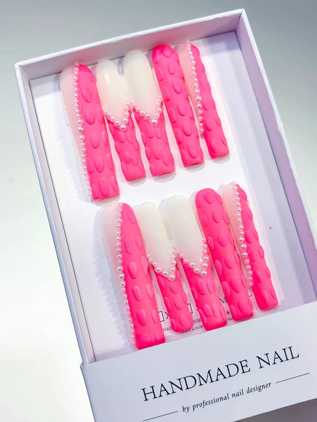 Pink White Silver Solid color Pearl 3D press on nails angled view