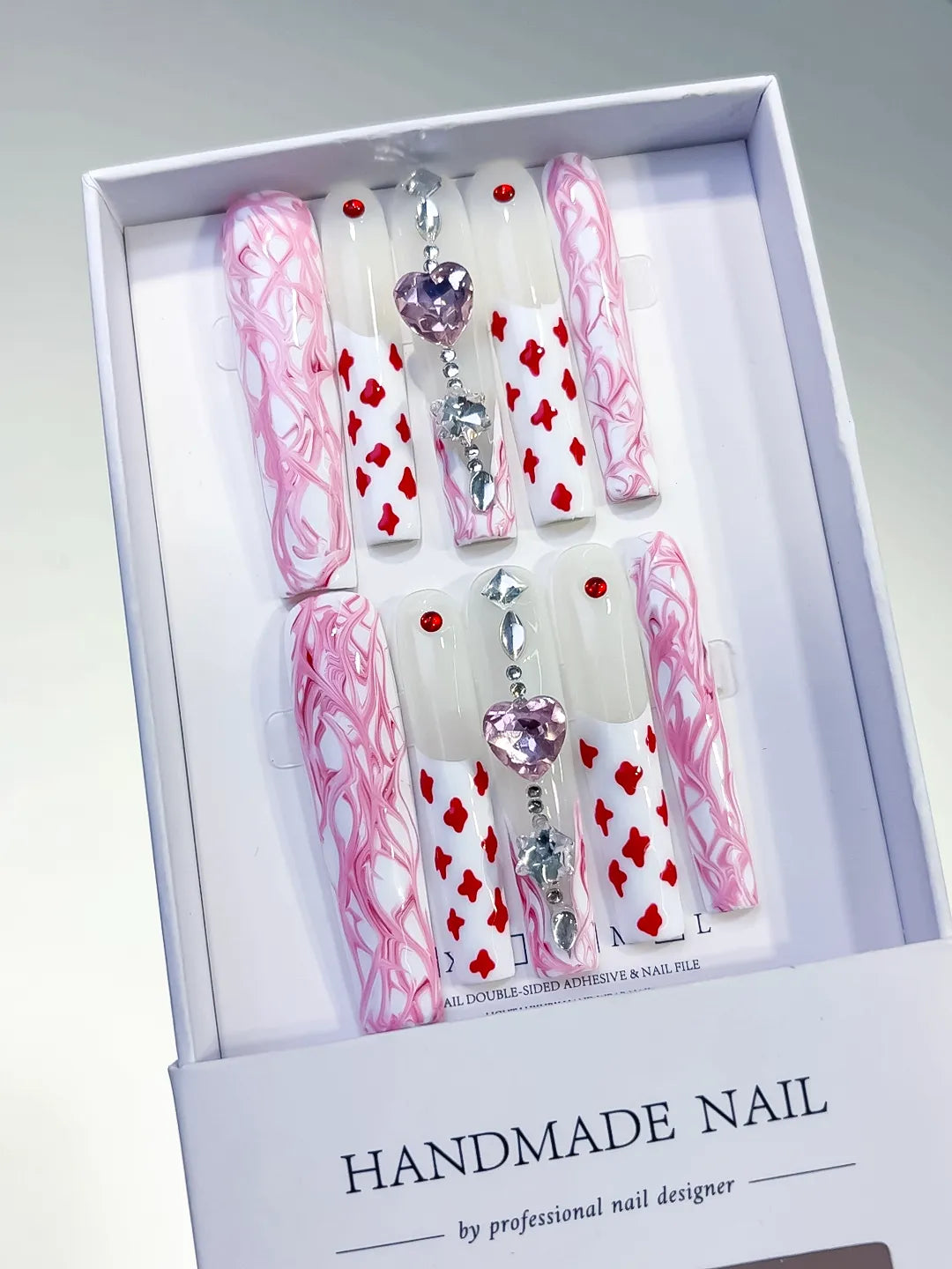 White Pink Red Silver Purple Abstract Heart Rhinestone Chain press on nails angled view