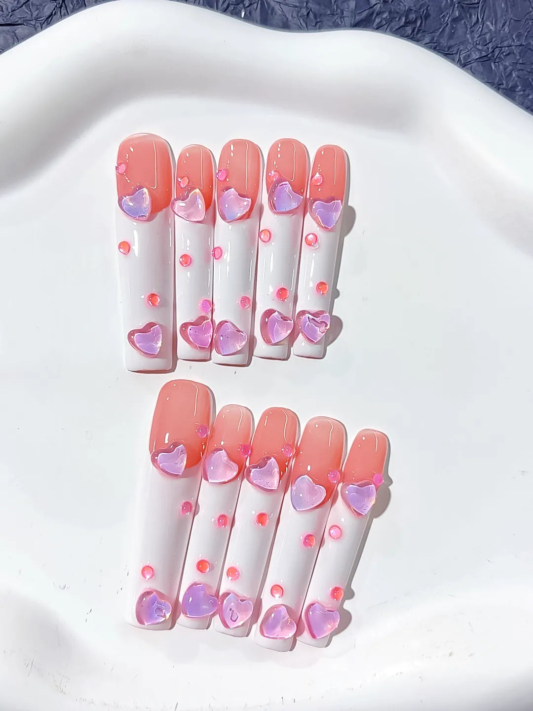Pink White Multicolor French tip Heart 3D press on nails detail view