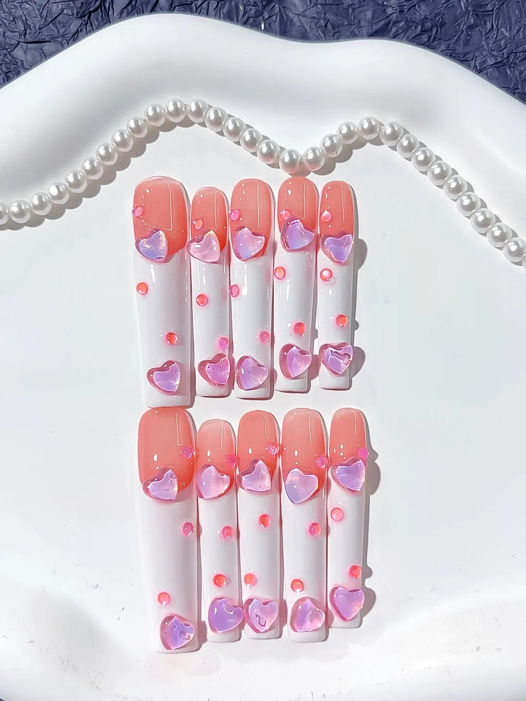 Pink White Multicolor French tip Heart 3D press on nails detail view