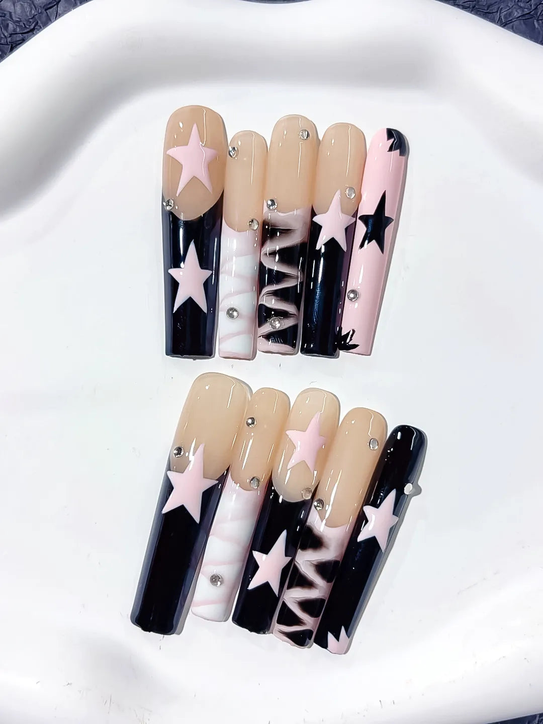 Nude White Pink Black Abstract Star Rhinestone 3D press on nails close up