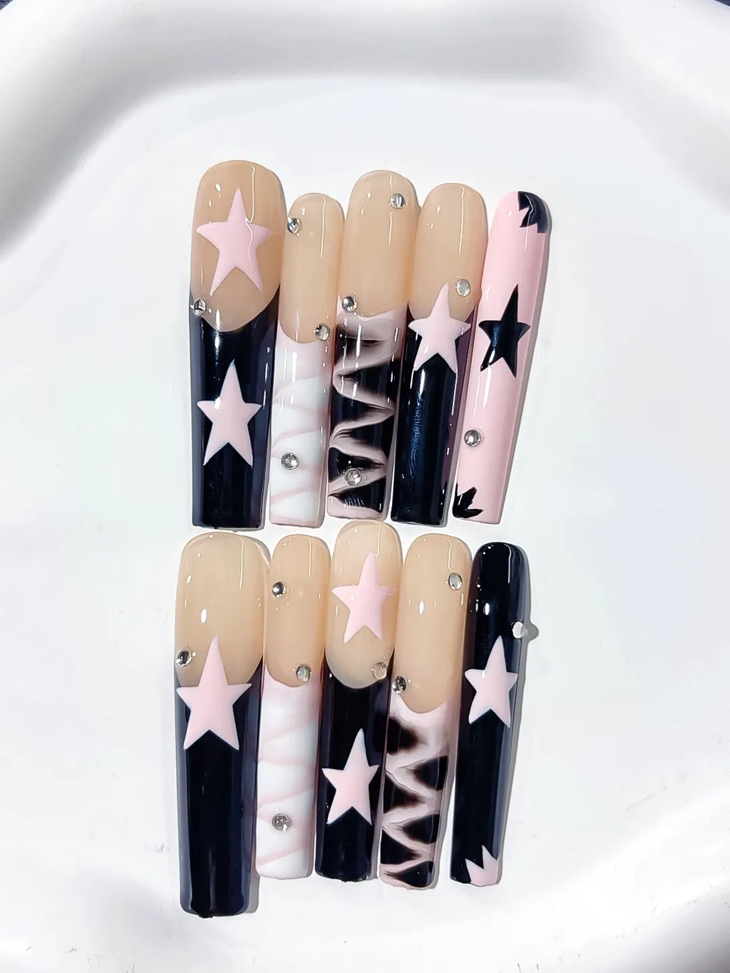 Nude White Pink Black Abstract Star Rhinestone 3D press on nails detail view