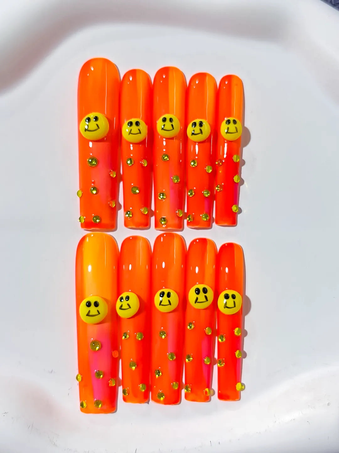 Orange Pink Yellow Ombre Smiley Rhinestone 3D press on nails close up
