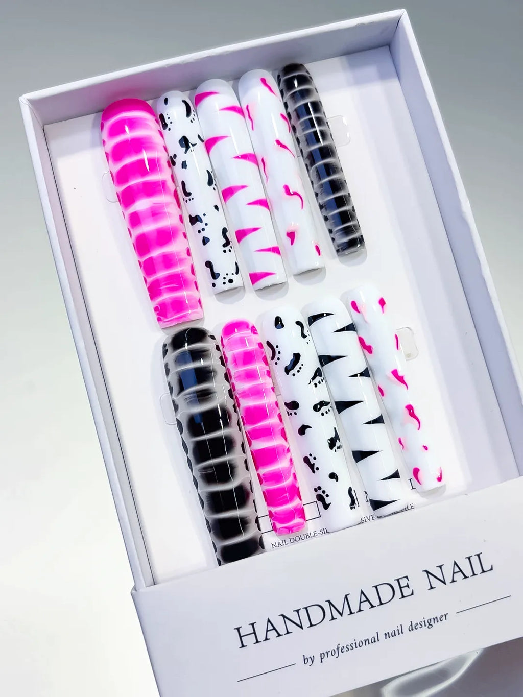 Pink White Black Abstract Stripe press on nails angled view
