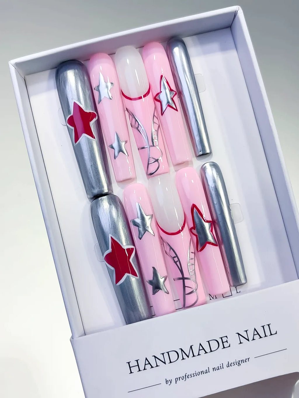 Pink Silver Red White Metallic Star 3D press on nails angled view