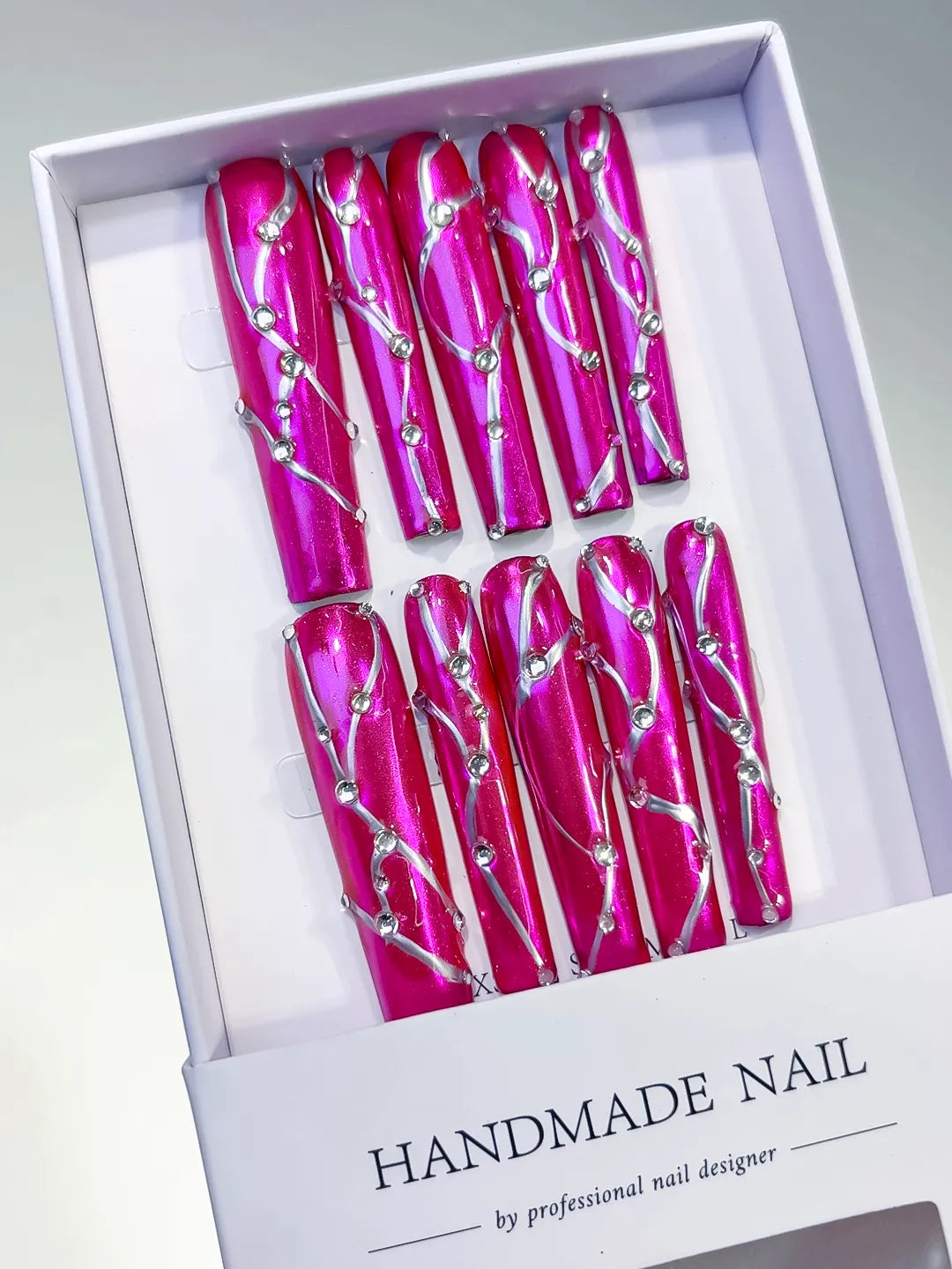 Pink Silver Metallic Rhinestone press on nails angled view