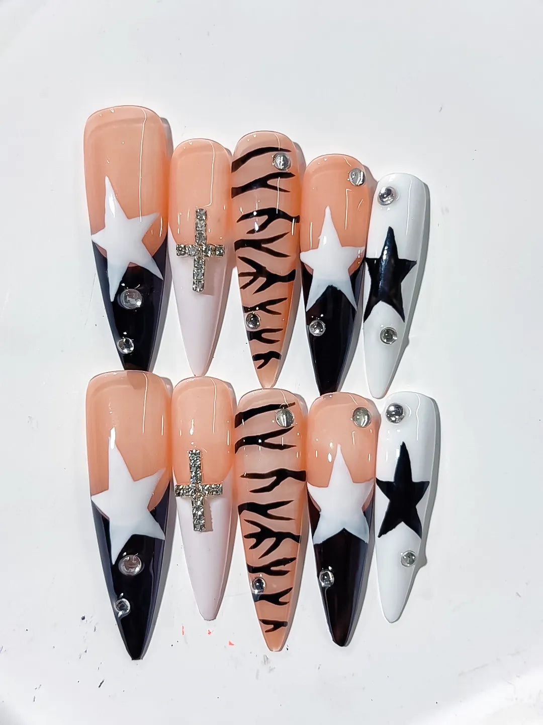 Nude White Black Abstract Star Animal Print Bow Rhinestone press on nails close up