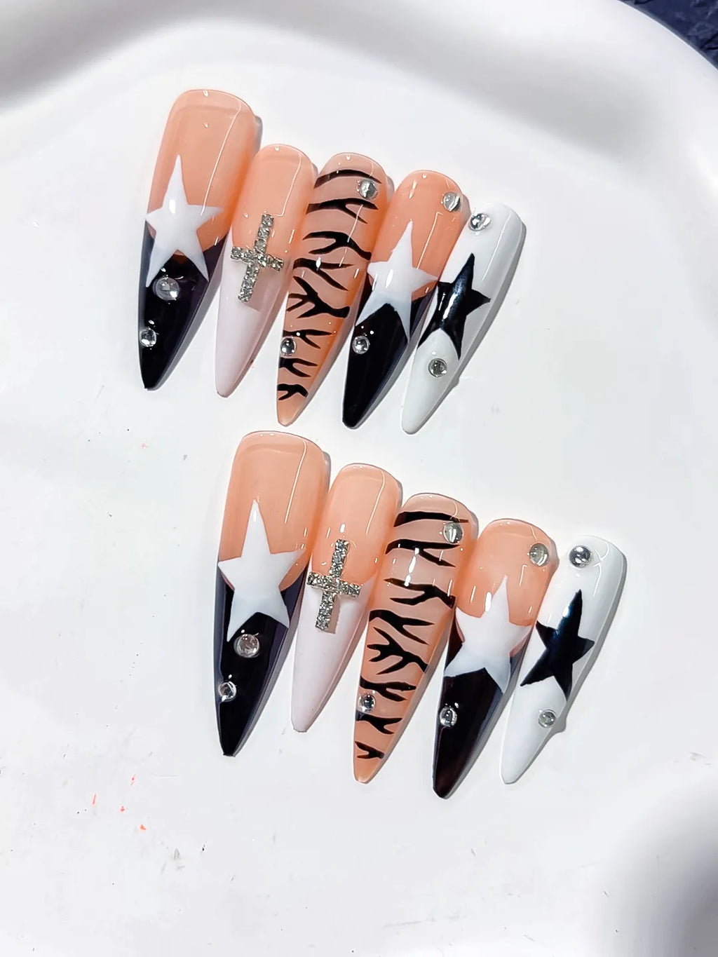 Nude White Black Abstract Star Animal Print Bow Rhinestone press on nails detail view