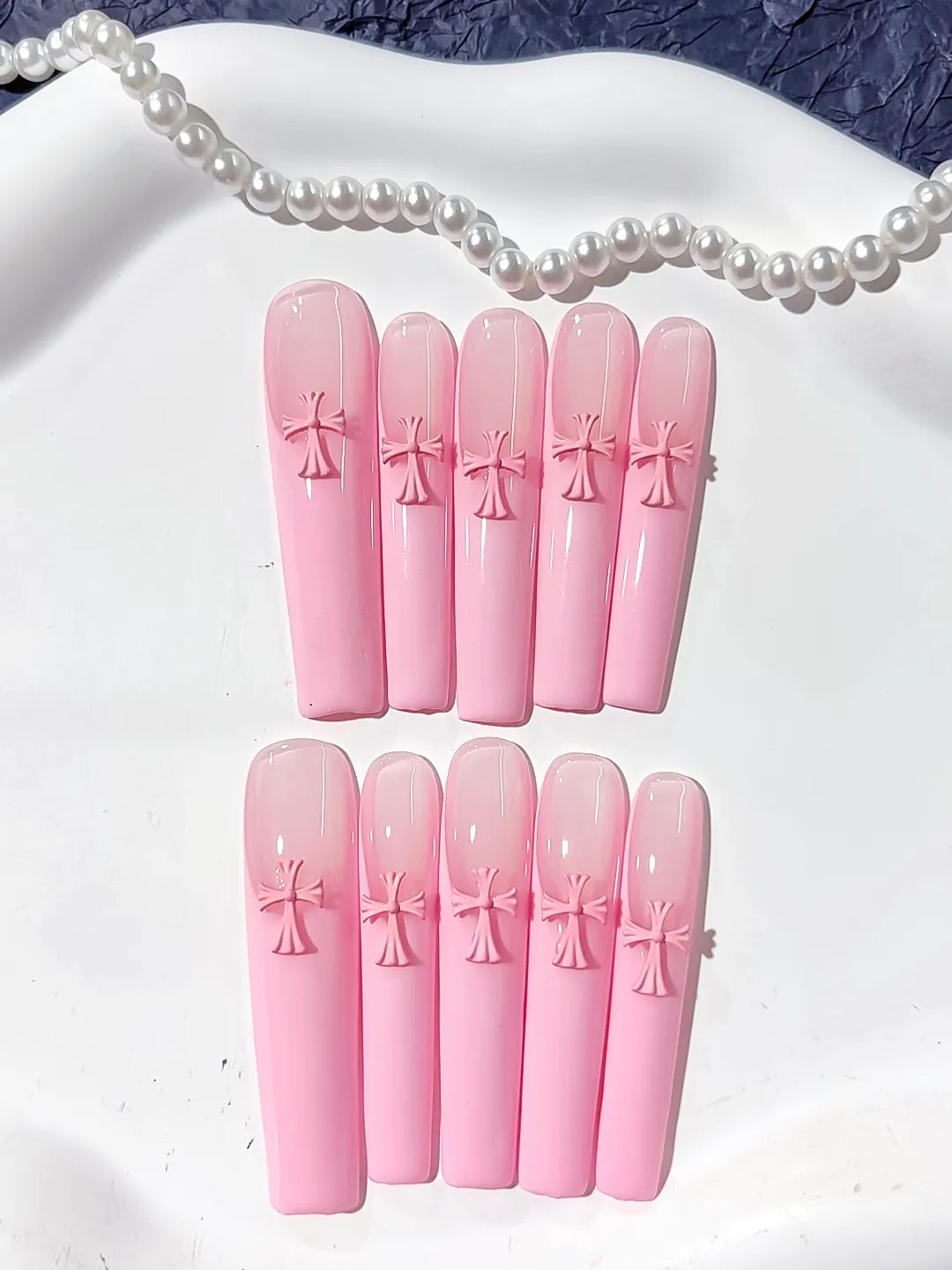 Pink Solid color Cross 3D press on nails detail view
