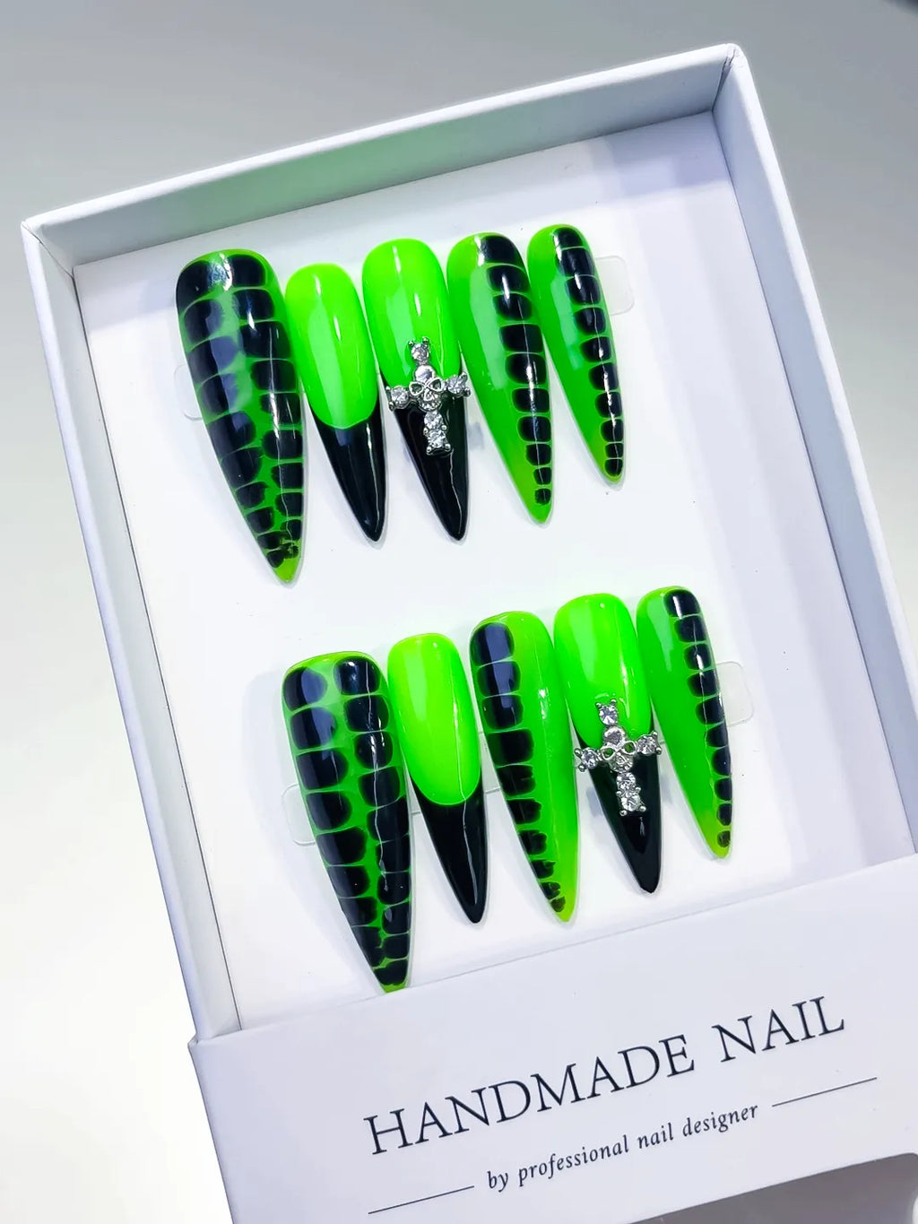 Green Black Silver Abstract Animal Print Cross Rhinestone press on nails angled view