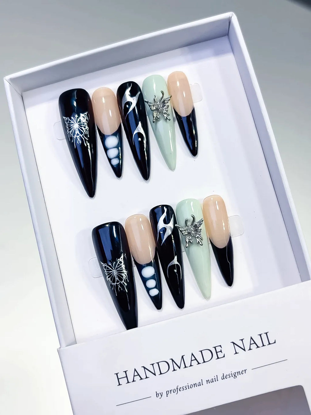 Black Nude Green White Silver Abstract Flame Butterfly Metallic Charm press on nails angled view