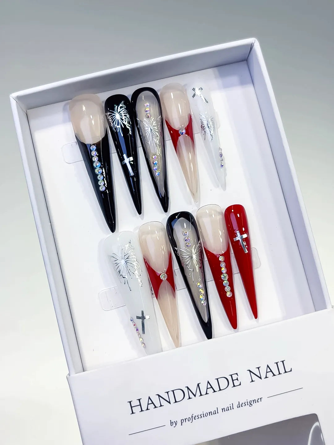 Black White Red Nude Silver Abstract Cross Butterfly Rhinestone press on nails angled view