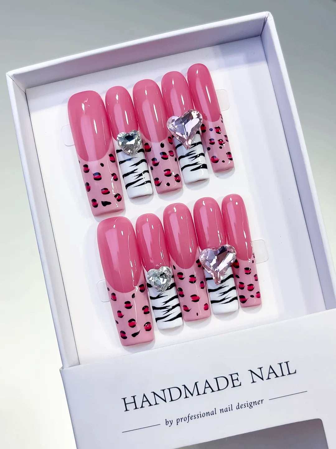 Pink White Black Silver Abstract Animal Print Heart Rhinestone press on nails angled view