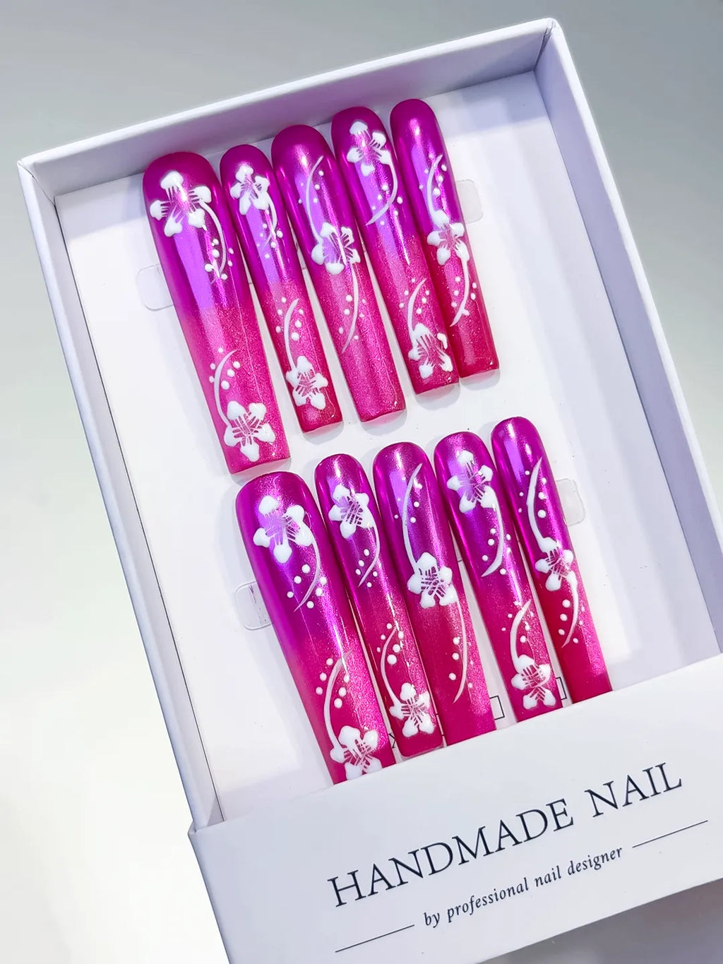 Pink White Floral press on nails angled view