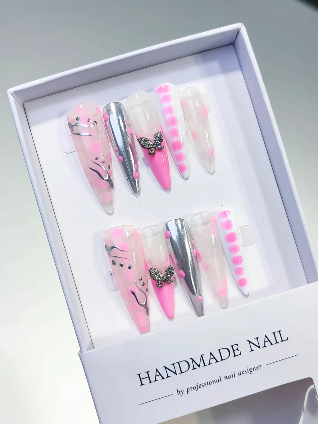 Pink White Silver Abstract Butterfly press on nails angled view