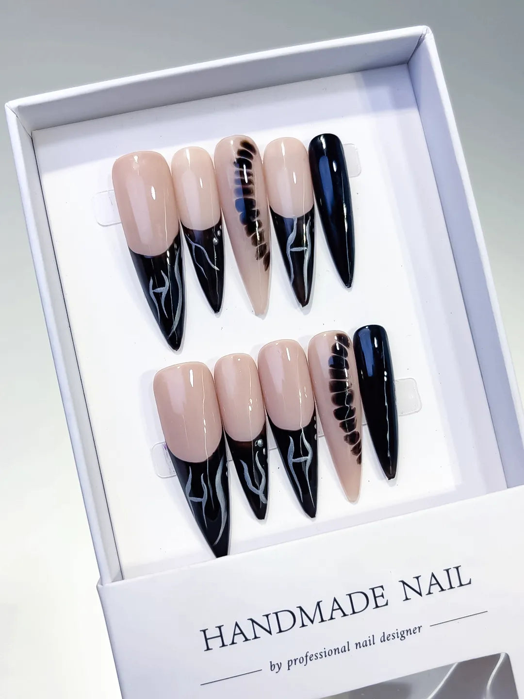 Nude Black Silver French tip Glitter press on nails angled view