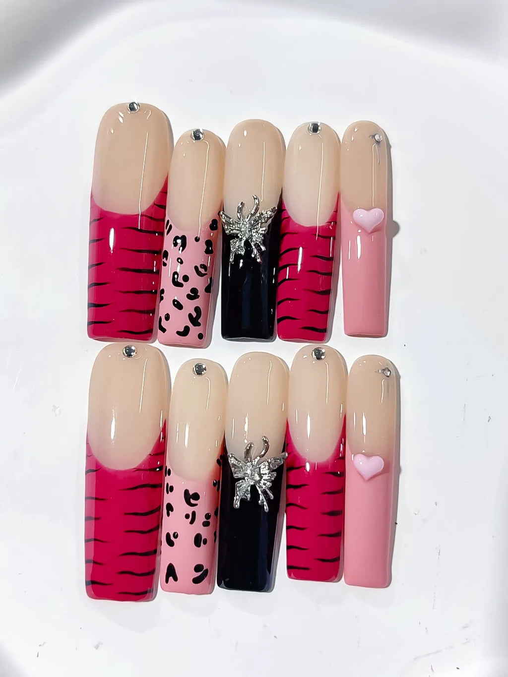 Nude Pink Black Abstract Animal Print Glitter press on nails close up