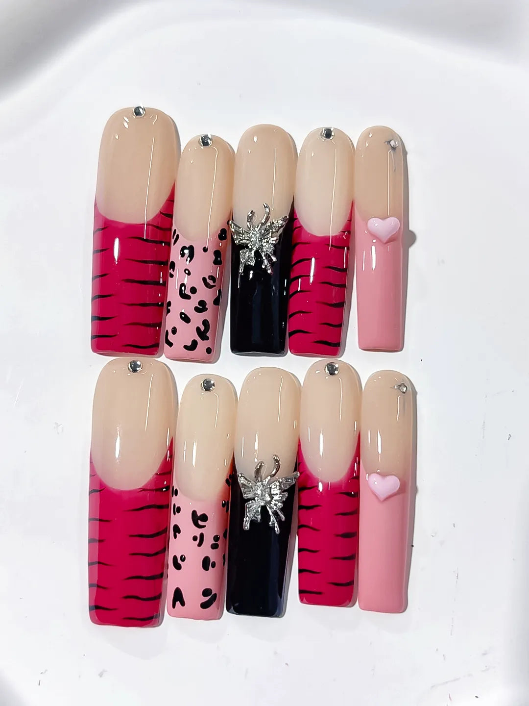 Nude Pink Black Abstract Animal Print Glitter press on nails close up