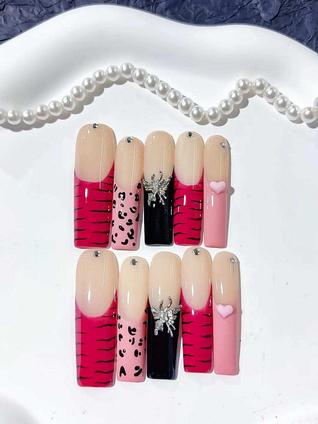 Nude Pink Black Abstract Animal Print Glitter press on nails detail view