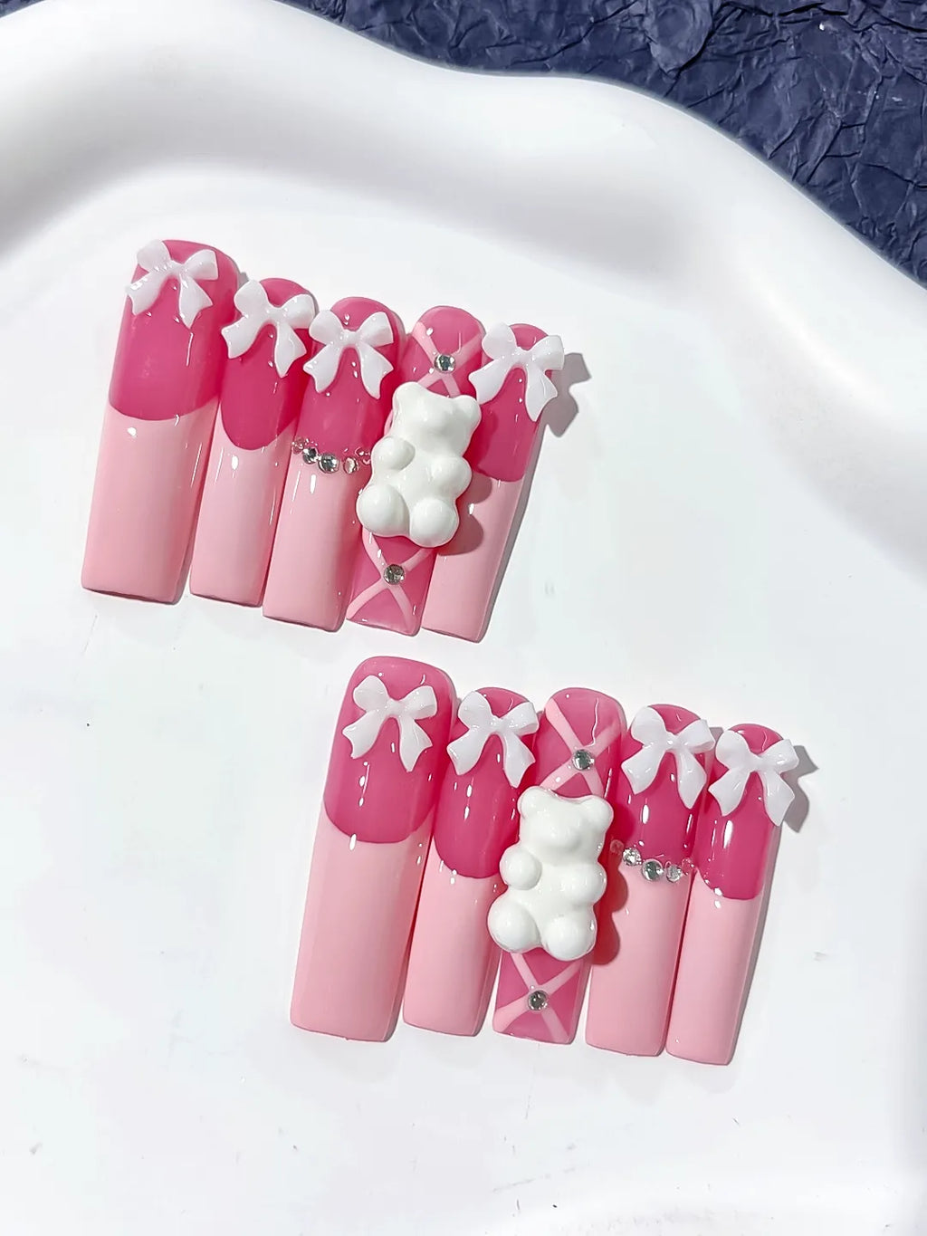 Pink White Solid color Bow Bear Rhinestone 3D press on nails close up