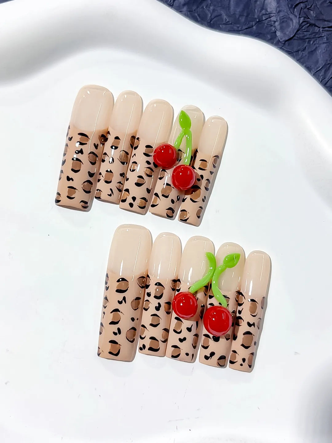 Nude Brown Black Red Green Abstract Animal Print Cherry 3D press on nails detail view