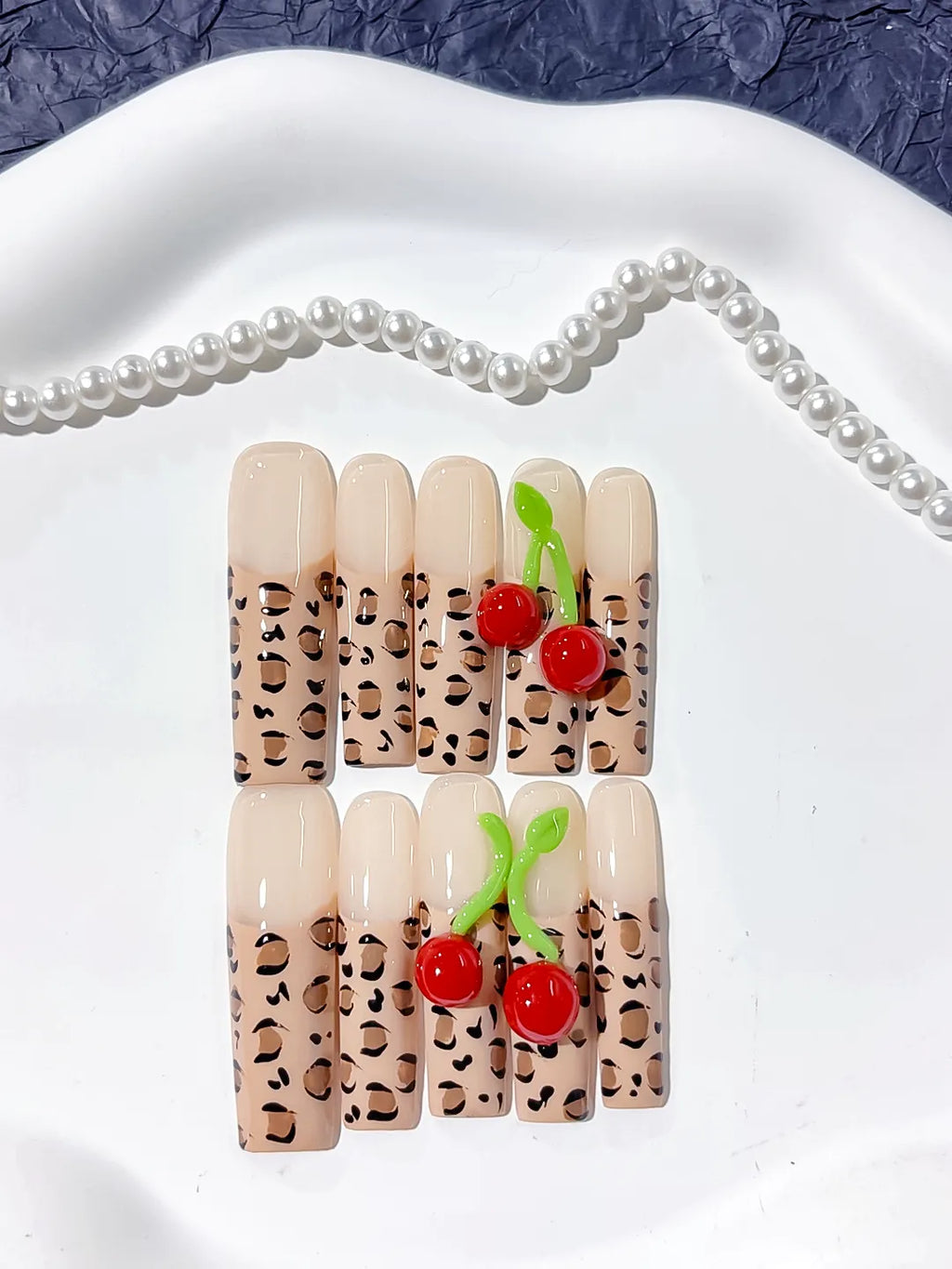 Nude Brown Black Red Green Abstract Animal Print Cherry 3D press on nails detail view