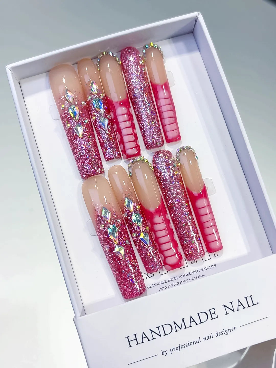 Nude Pink Silver Glitter Rhinestone press on nails angled view
