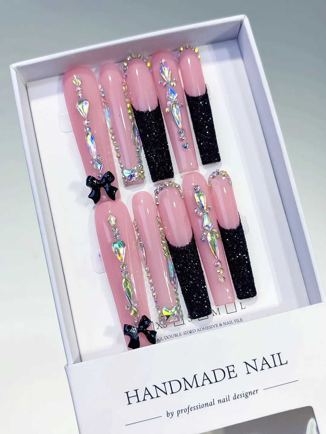 Pink Black Silver Glitter Bow Rhinestone press on nails angled view