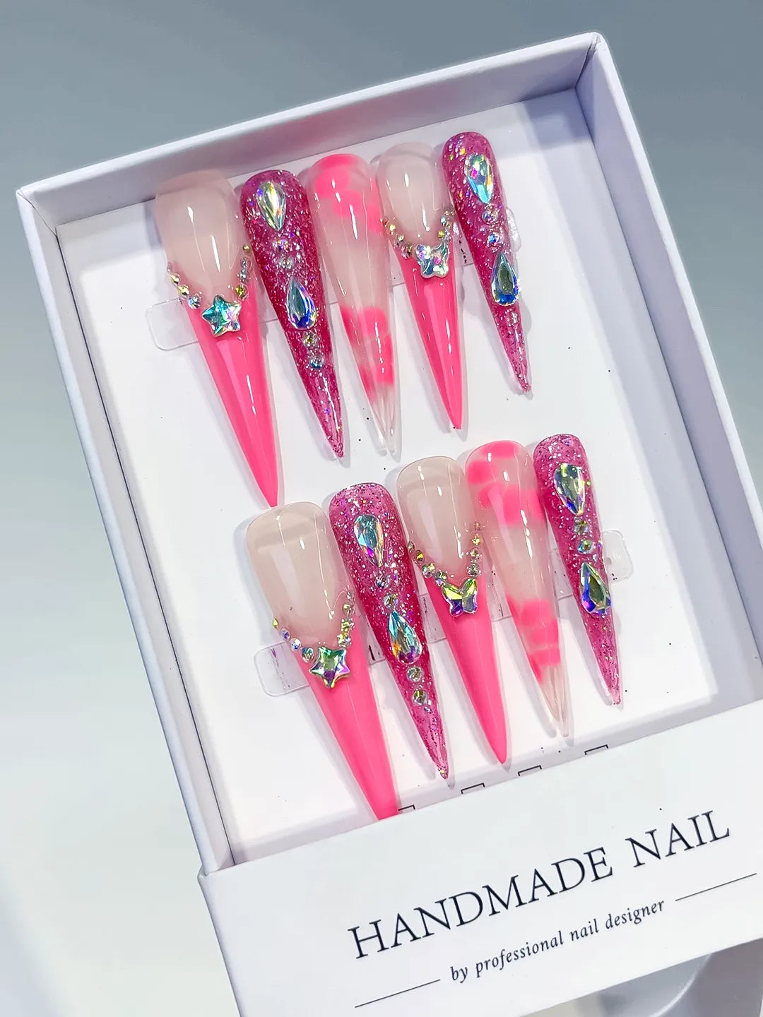 Nude Pink Silver Glitter Star Rhinestone press on nails angled view