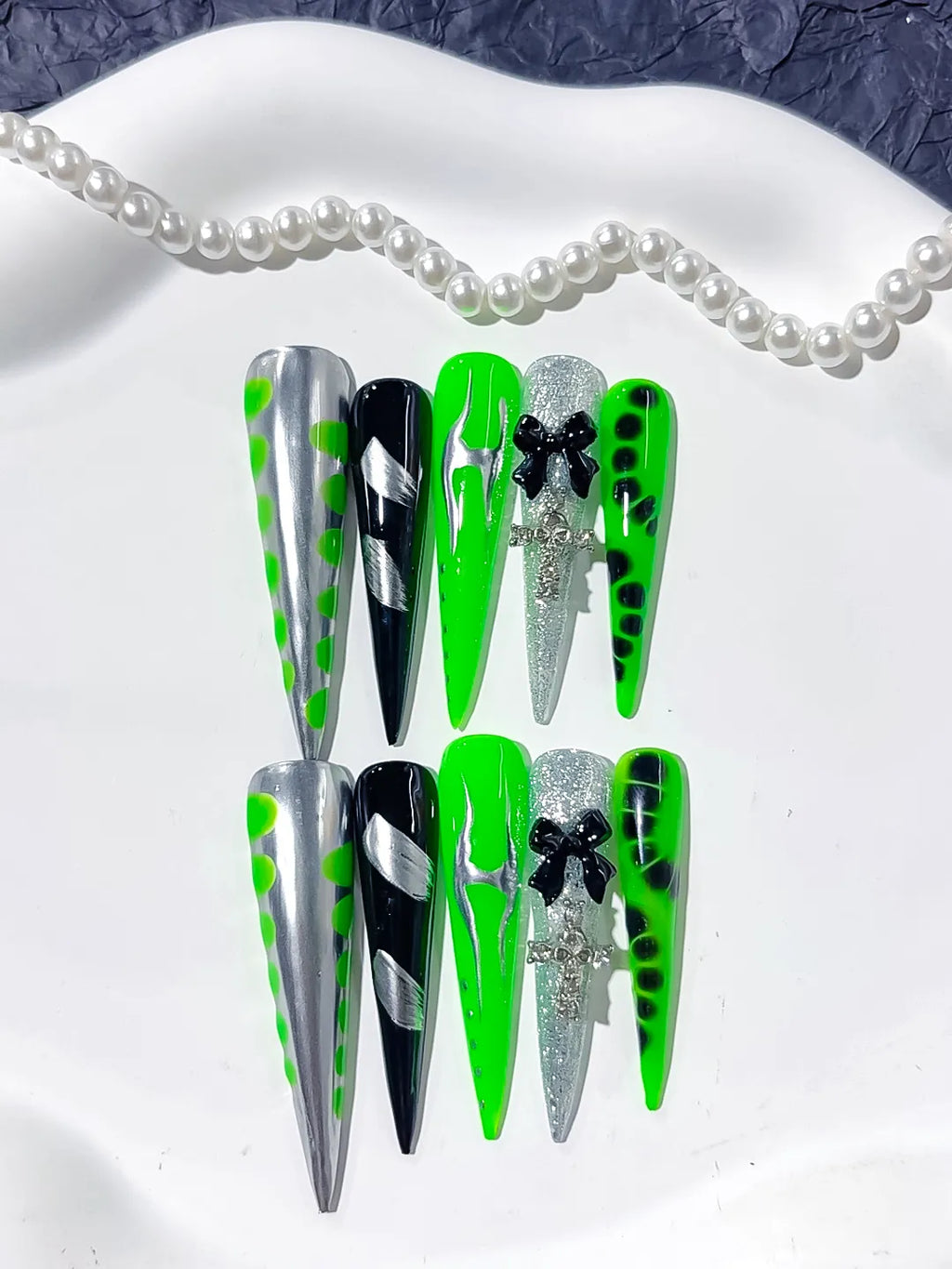 Silver Black Green Abstract Bow Cross Glitter press on nails detail view