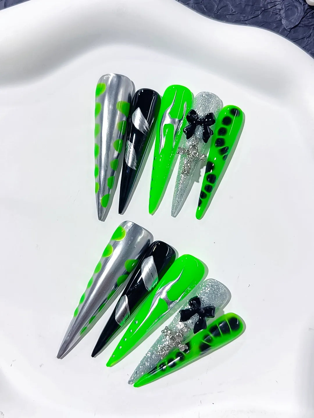Silver Black Green Abstract Bow Cross Glitter press on nails close up