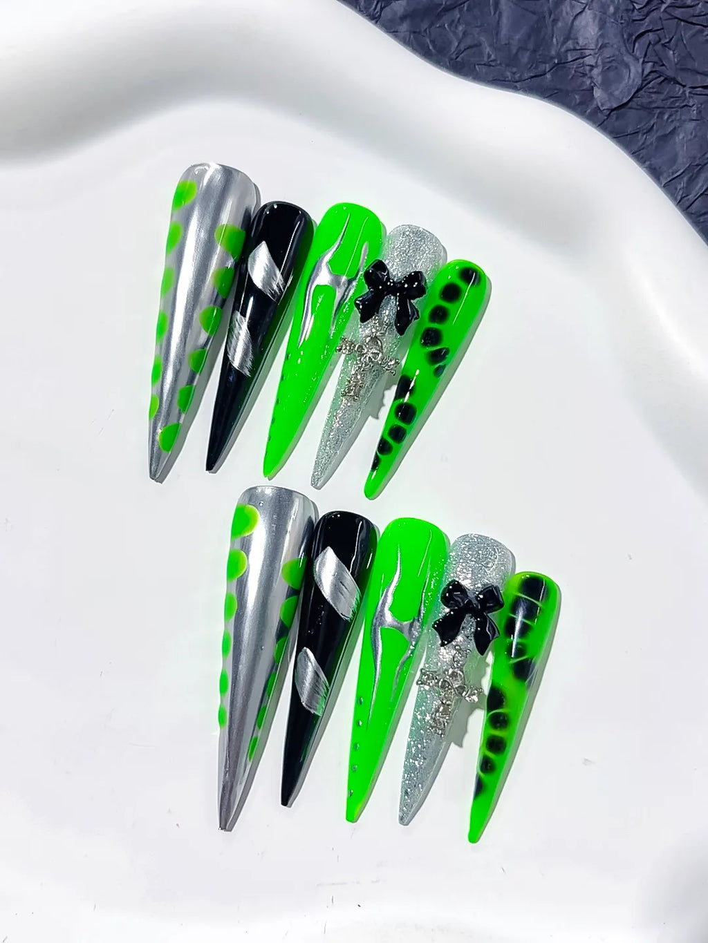 Silver Black Green Abstract Bow Cross Glitter press on nails detail view