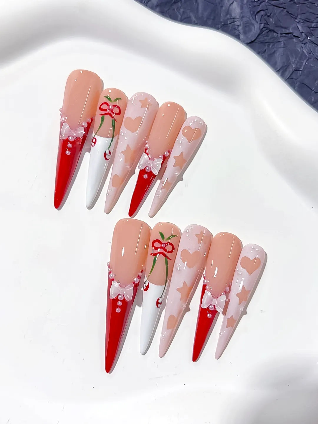 Nude Red White Pink Abstract Cherry Bow press on nails detail view