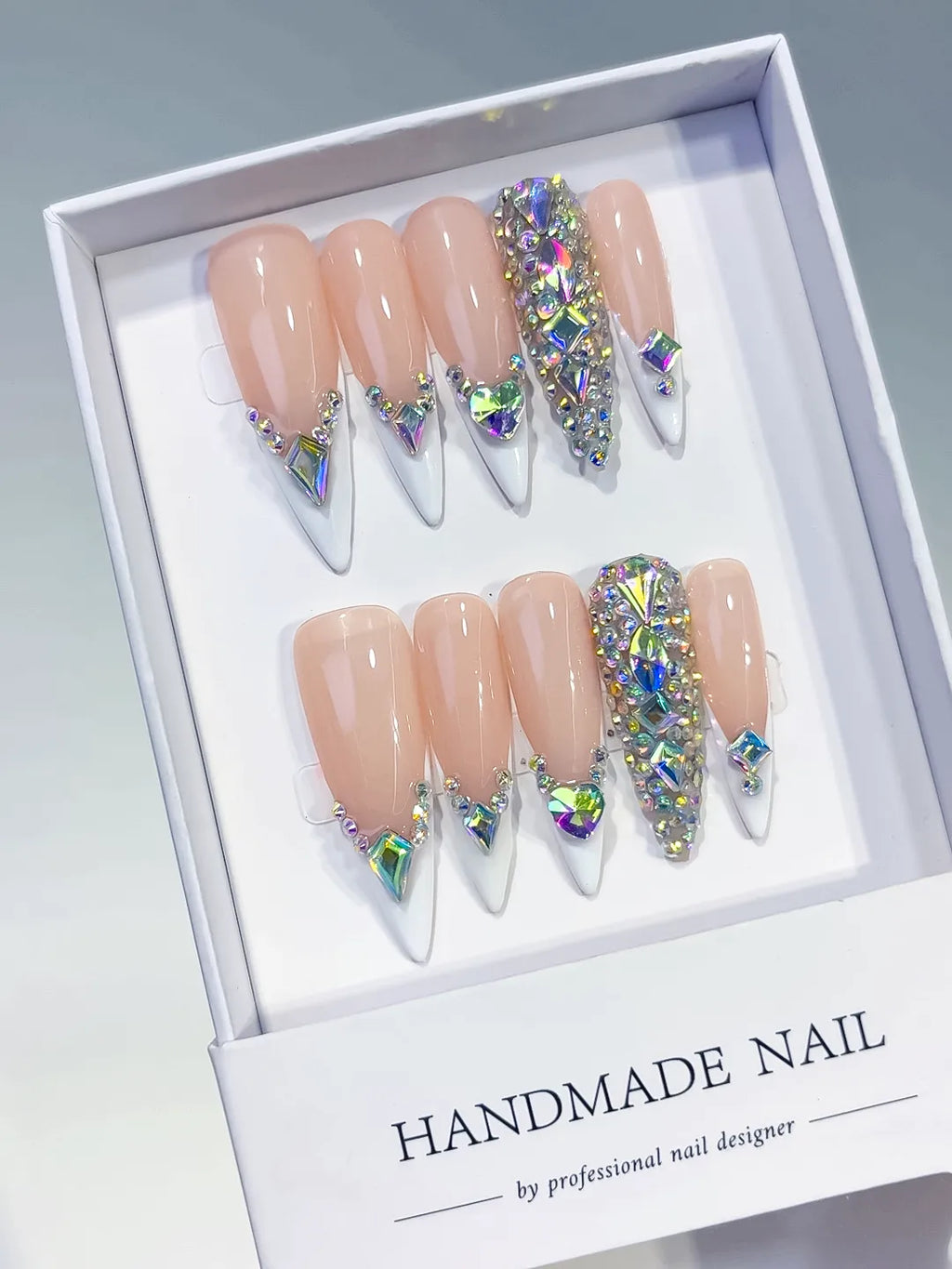 Nude White Silver Multicolor French tip Rhinestone press on nails angled view
