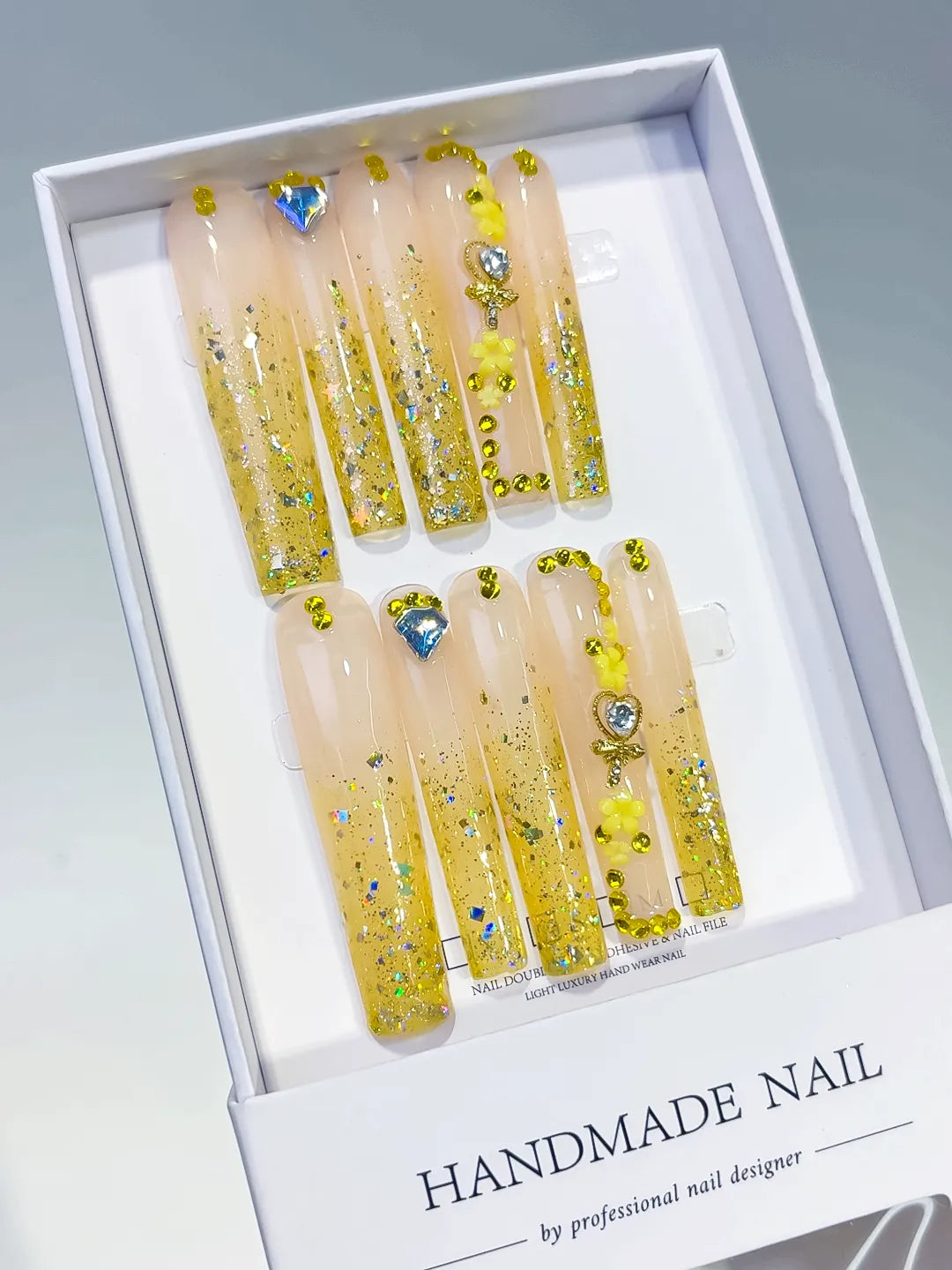 Nude Yellow Gold Blue Silver Glitter Flower Rhinestone press on nails angled view