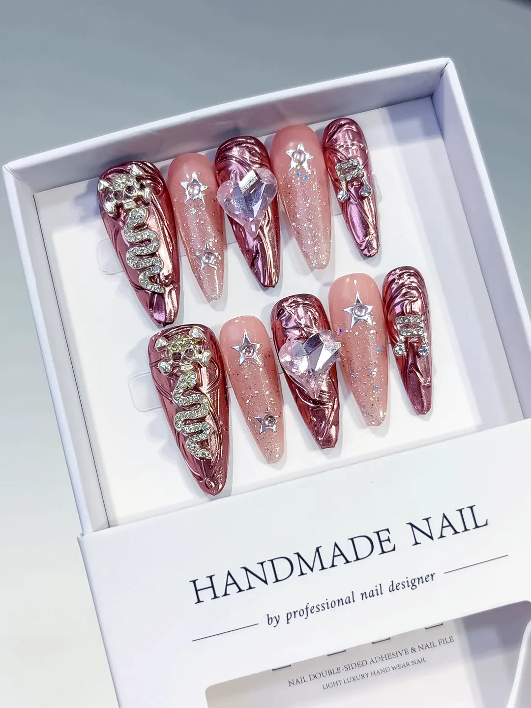 Gold Pink Silver Metallic Snake Heart Star Rhinestone press on nails angled view