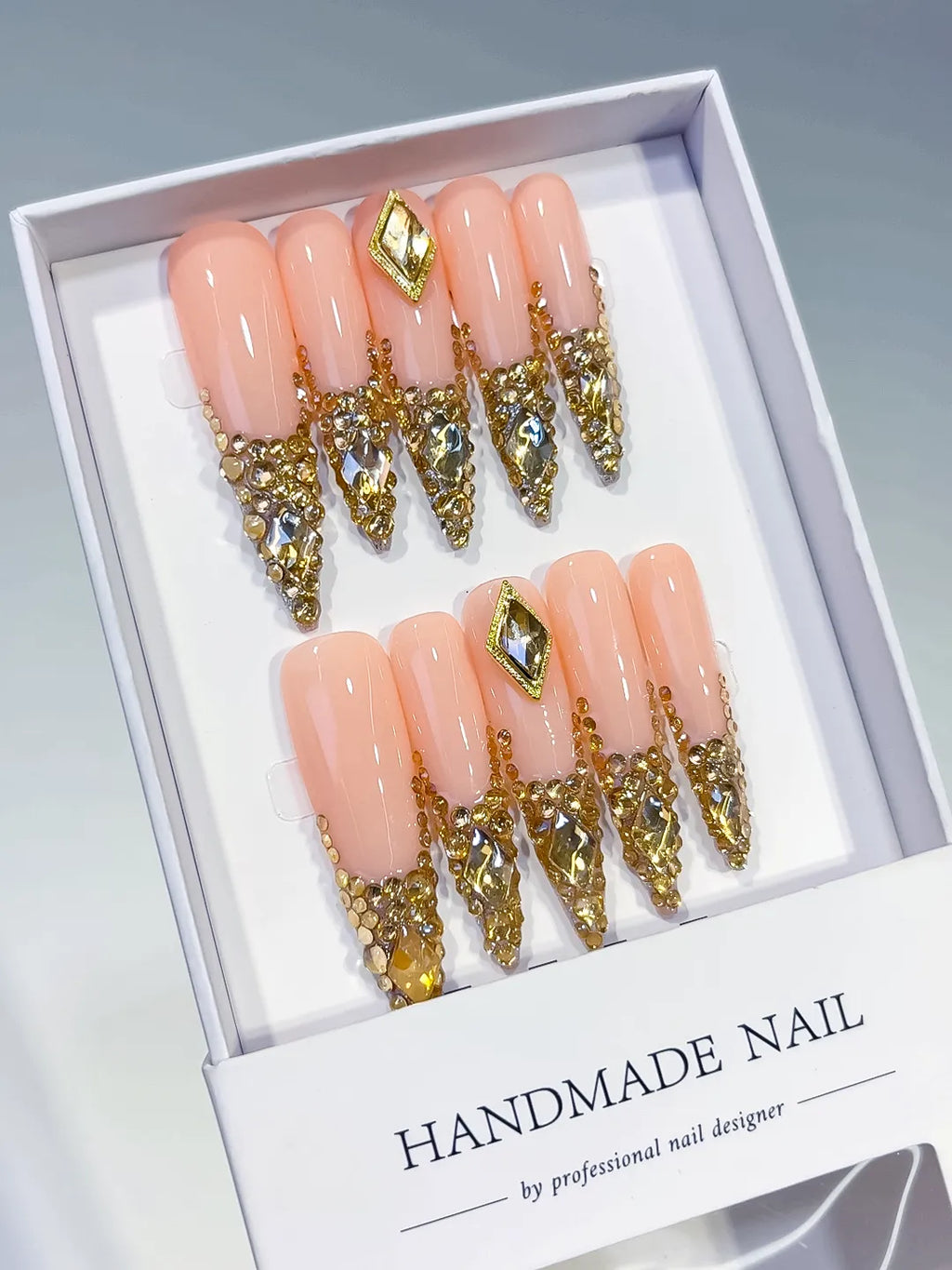 Nude Gold Silver Glitter press on nails angled view