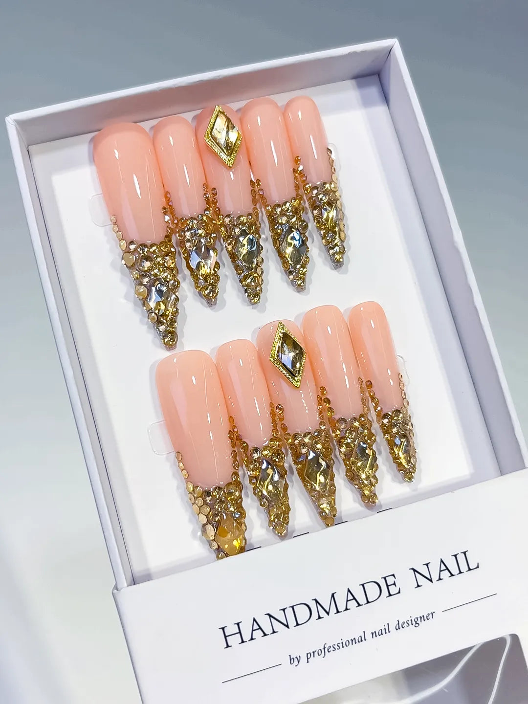 Nude Gold Silver Glitter press on nails angled view