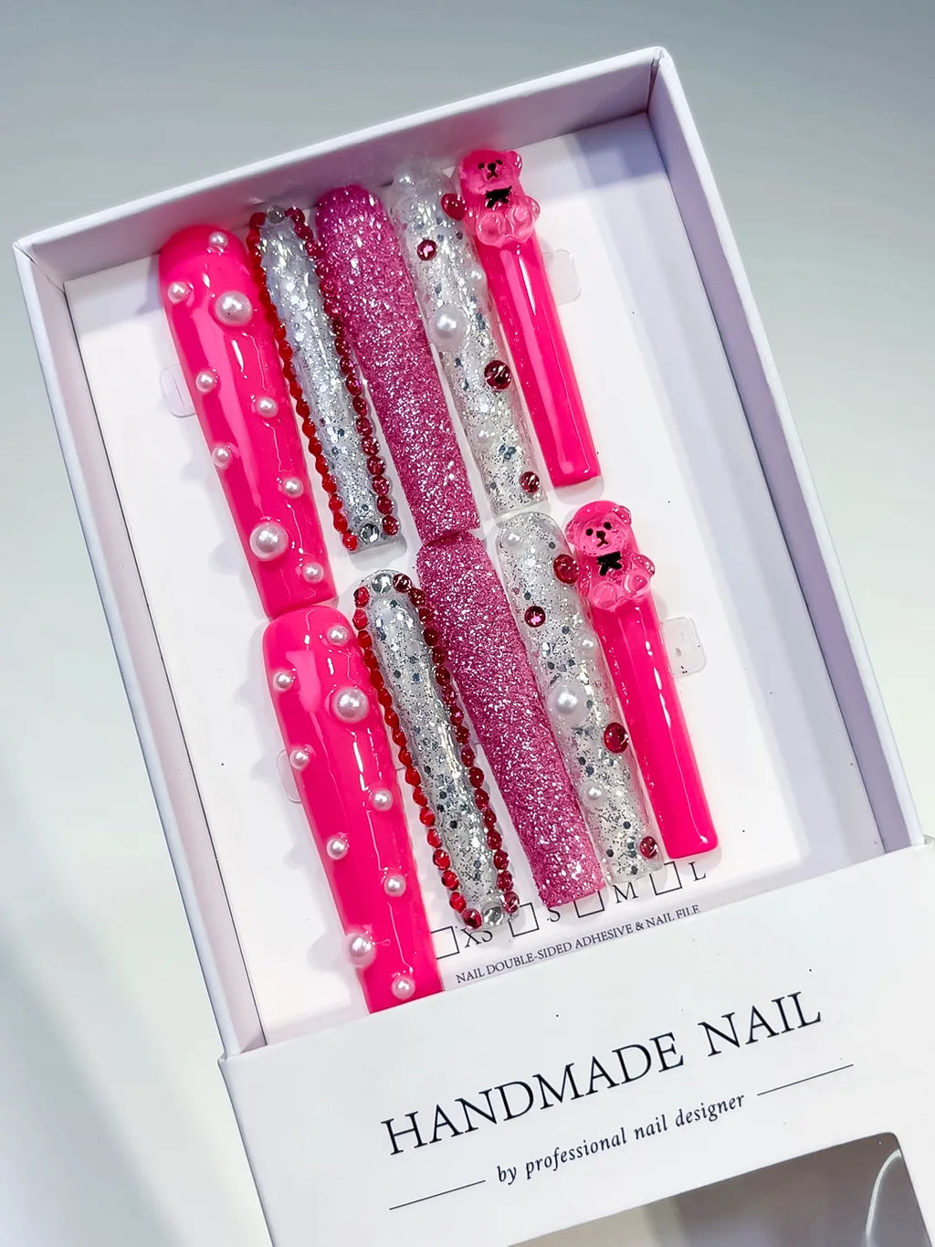 Pink Silver White Glitter Bear Pearl Rhinestone 3D press on nails angled view