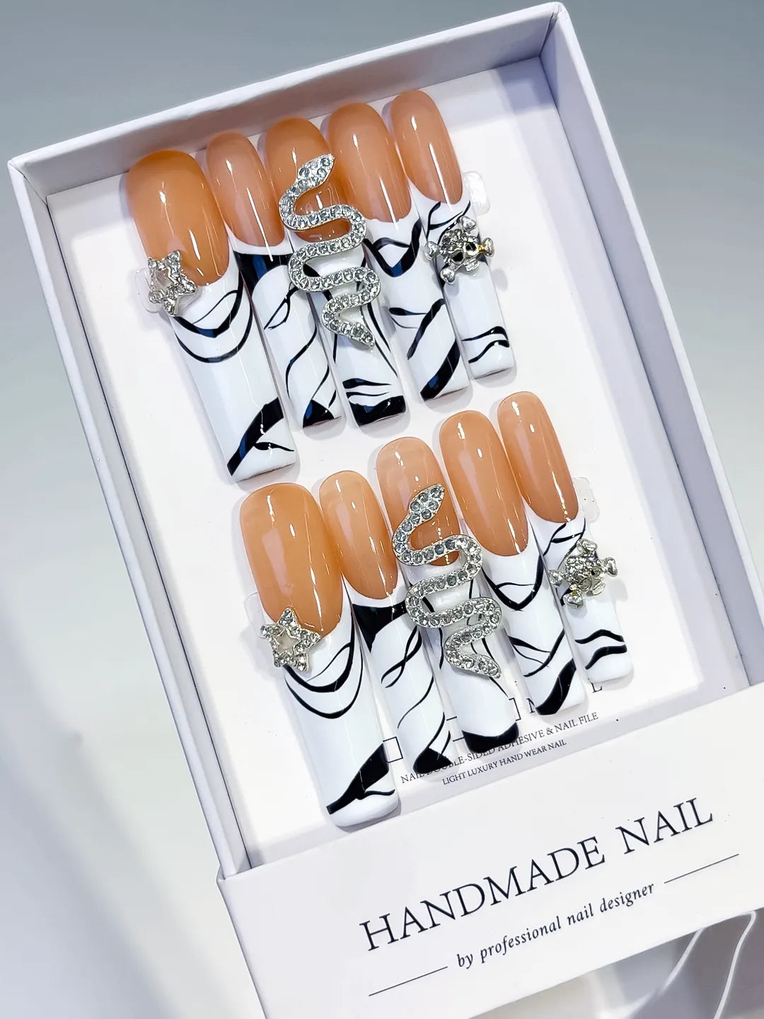 Nude White Black Silver Abstract Snake Star Rhinestone press on nails angled view