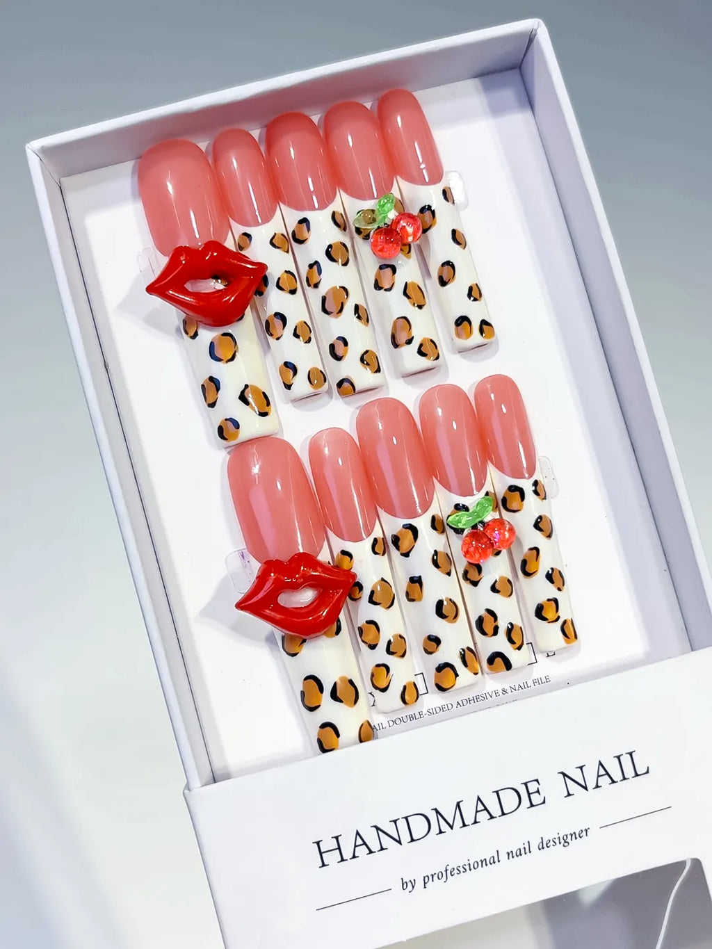 Nude Pink White Red Green Black Abstract Lip Print Strawberry Animal Print press on nails angled view