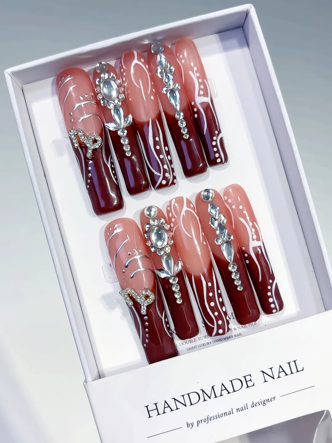 Nude Red White Silver Abstract Rhinestone press on nails angled view