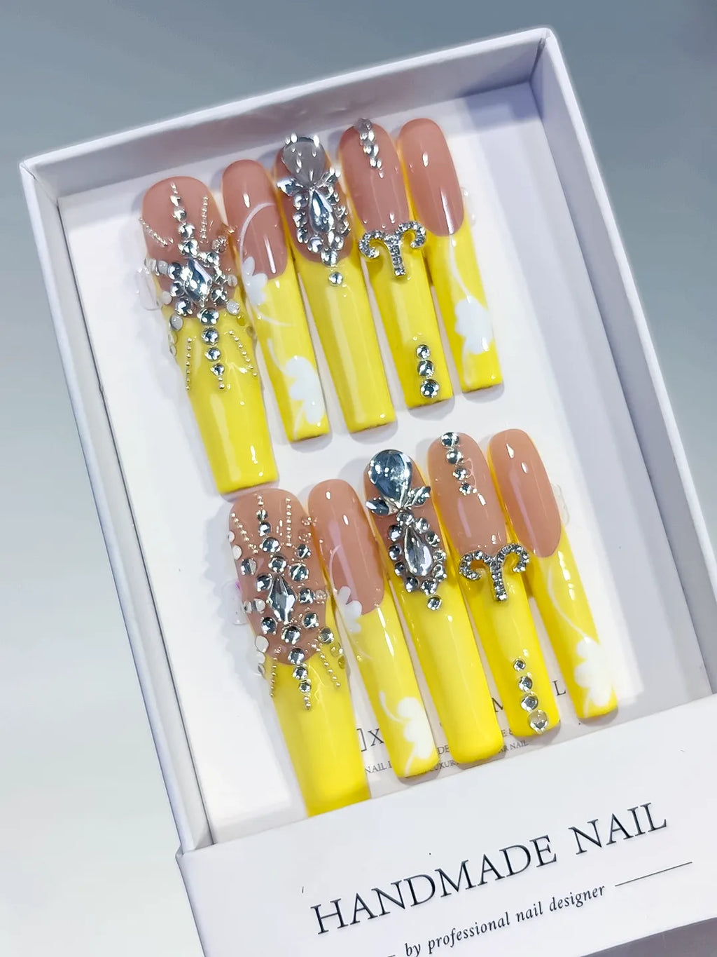 Nude Yellow Silver Solid color Rhinestone press on nails angled view