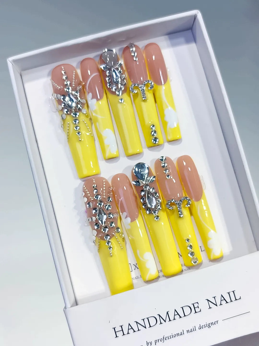 Nude Yellow Silver Solid color Rhinestone press on nails angled view