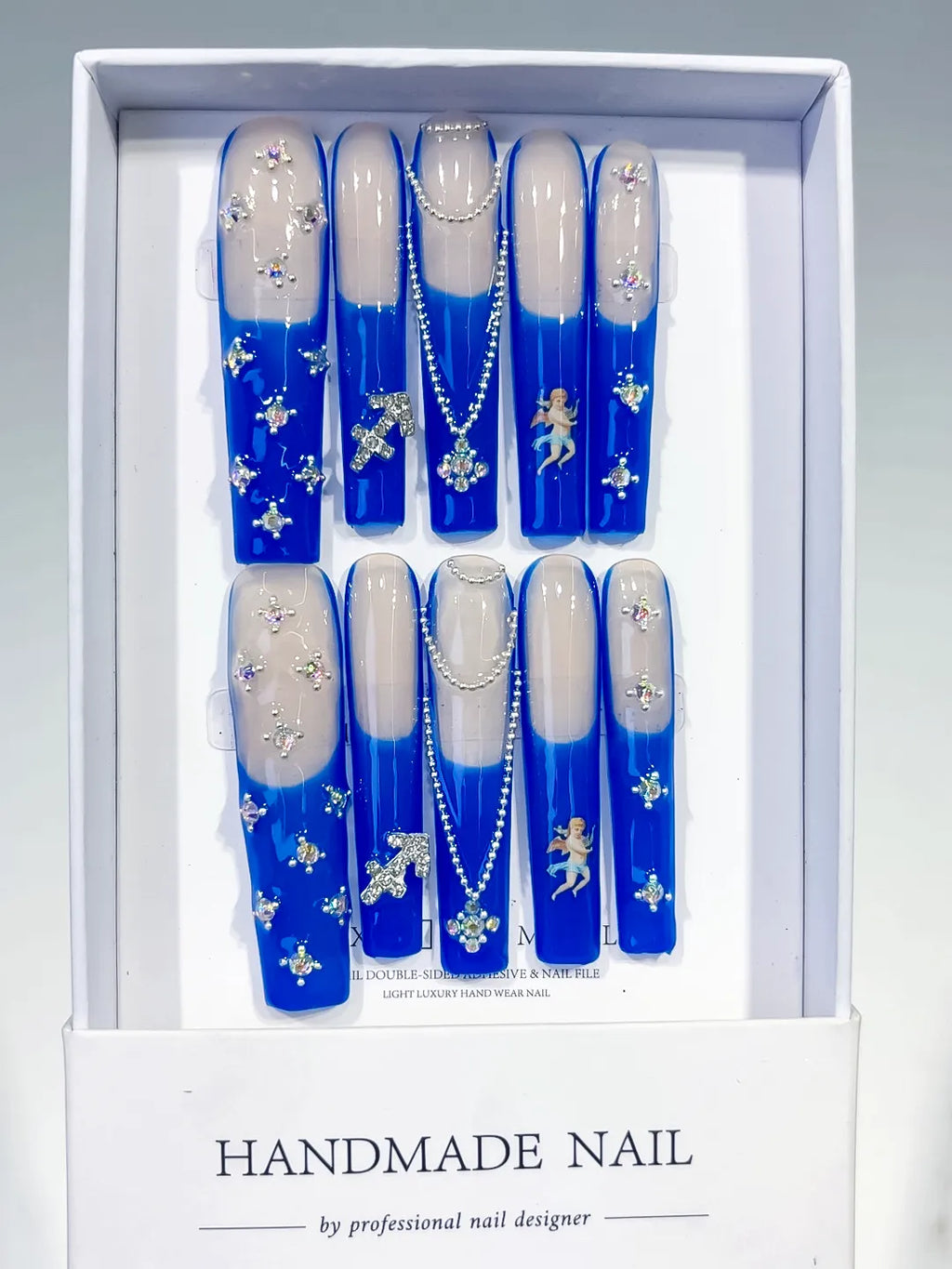 Nude Blue White Silver French tip Angel Cross Pearl Rhinestone press on nails full set view