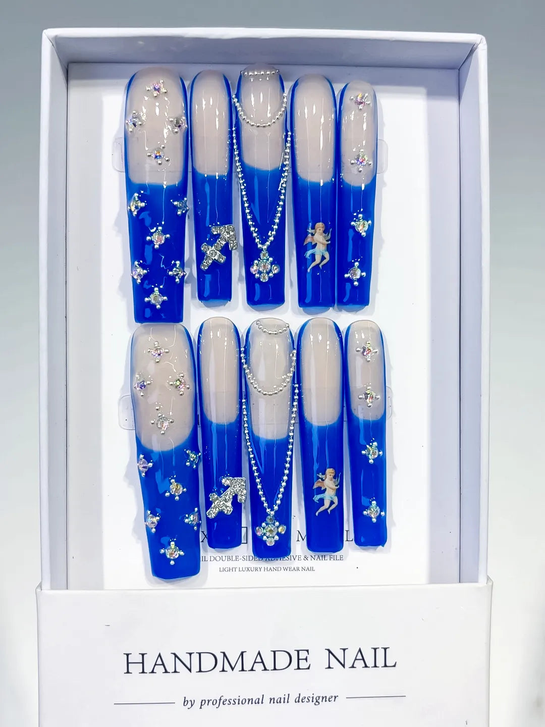 Nude Blue White Silver French tip Angel Cross Pearl Rhinestone press on nails full set view