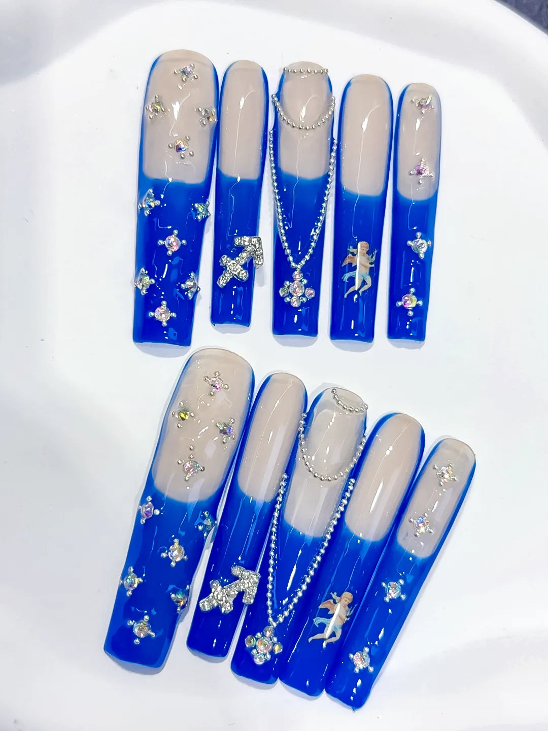 Nude Blue White Silver French tip Angel Cross Pearl Rhinestone press on nails close up