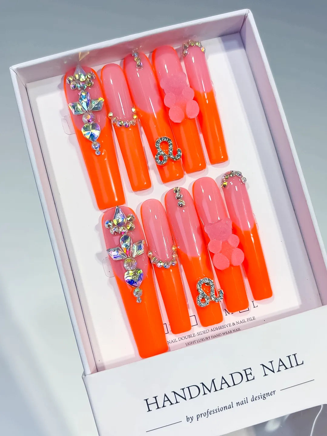 Orange Pink Silver Multicolor Ombre Bear Rhinestone 3D press on nails angled view
